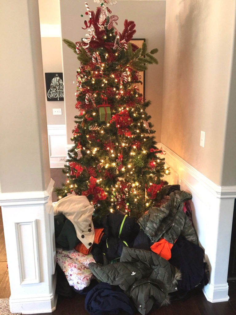 Walbridge Southeast Get Work Director Joey Smith and his wife, Lindsay, welcomed colleagues from the Charlotte office to their home in Waxhau, NC, for a holiday party. It was part celebration and part coat drive. The WSE team contributed 51 coats to be given out to local schoolchildren in need.