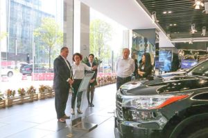 Mark McClelland and Delphine Grattan tour a facility in China