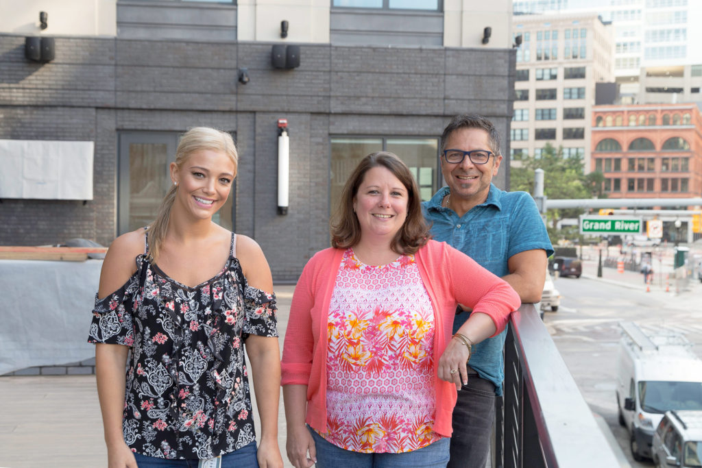 The 28 Grand project team, (l-r) Samantha Russo, Kristie Bieniewicz and Dominic Pizzo, enjoy the moment as the downtown Detroit project wraps up.